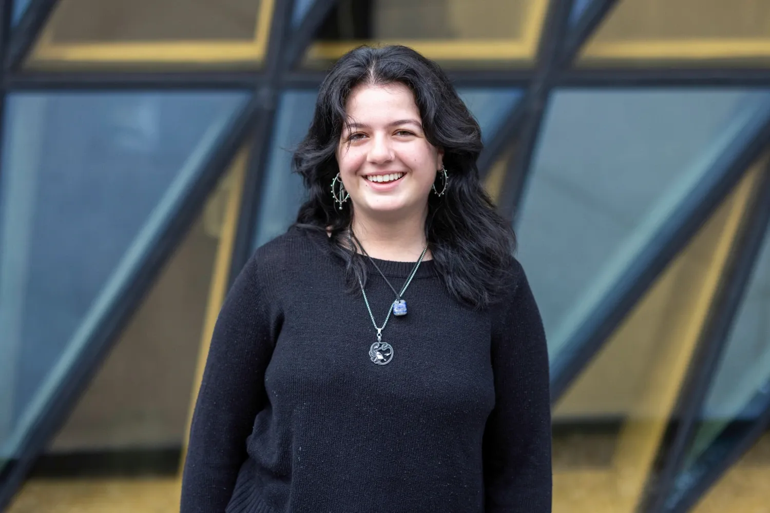 Portrait photo in front of Aula Medica of one of the digital student ambassadors for KI’s English-taught programmes for the academic year 2025–2026.