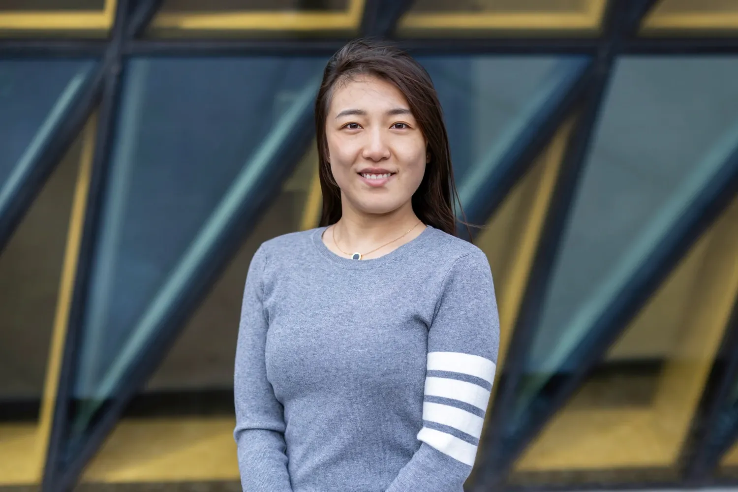 Portrait photo in front of Aula Medica of one of the digital student ambassadors for KI’s English-taught programmes for the academic year 2025–2026.