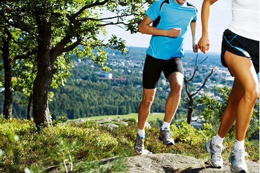 Picture of two people running.