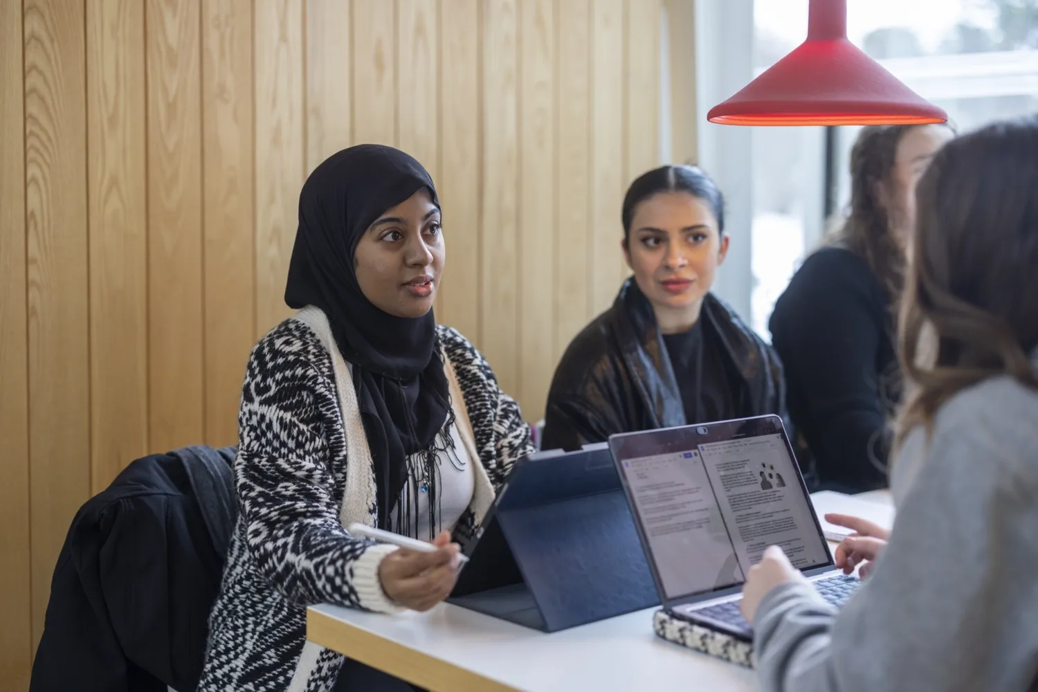 Students studying together at campus Solna.