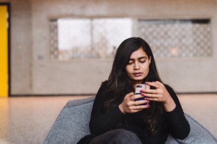 Student with phone.